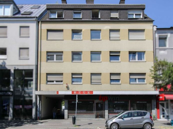 Edificio residencial y comercial con 10 viviendas y una unidad comercial en una ubicación céntrica – Foto 1