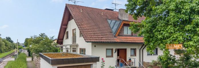 IMMORath.de - Doppelhaushälfte mit Einliegerwohnung und Garage