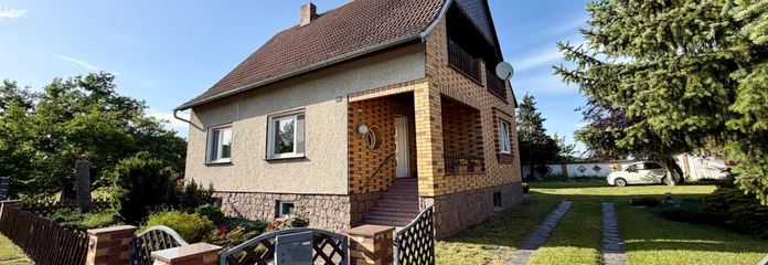 Gepflegtes Familienidyll mit großem Garten, Nebengelass und moderner Wärmepumpe – Ansicht