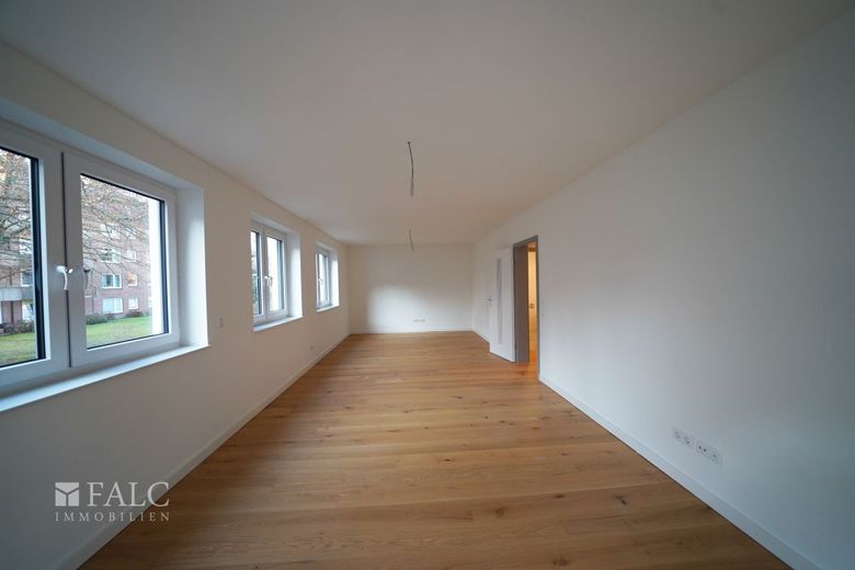 Energieeffizienter Neubau mit 3 Wohneinheiten und Business-Suite – WHG2-Wohn-Esszimmer