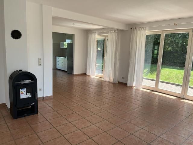 Attraente casa unifamiliare a Wangels – Wohnbereich mit Kaminofen