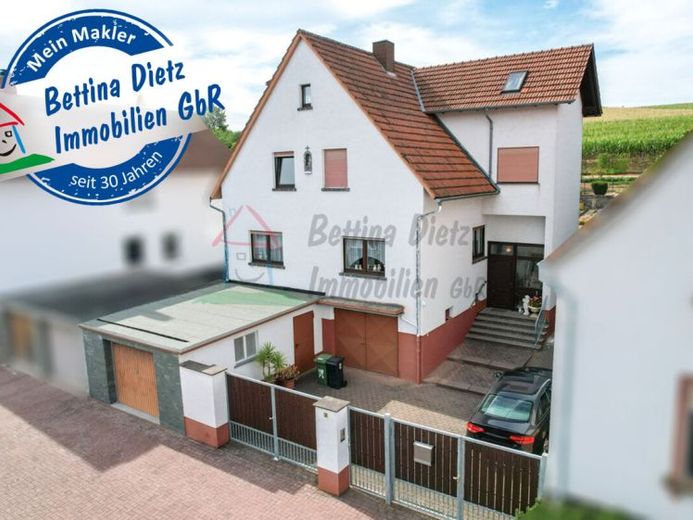 Casa bifamiliare ben curata con 2 garage e ampio giardino a Schaafheim - Radheim! – Foto 1