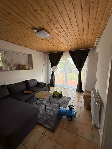 Zur Vermietung steht eine gemütliche 3-Zimmer-Wohnung in Neuenkirchen-Vörden – Wohnzimmer