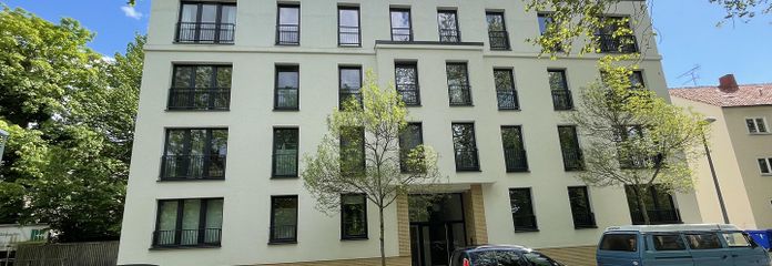 Schöne und großzügige 3-Zimmer Wohnung im Neubau mit TG, Süd Balkon – Hausansicht