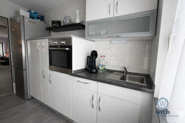 Charmante 3-Zimmer-Wohnung mit Balkon und Blick ins Grüne und Hobbyraum in Saarlouis – Küche