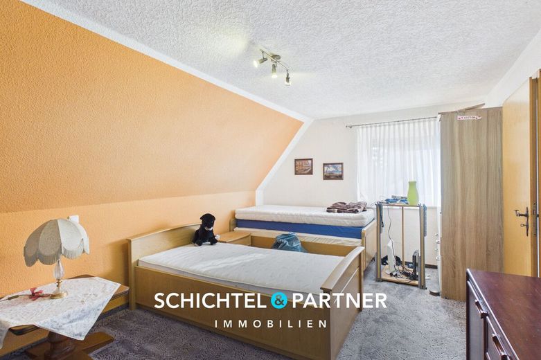 Hambergen | Freistehendes Einfamilienhaus mit Kamin und großem Grundstück – S&amp;P | Schlafzimmer