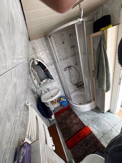 Bad mit Dusche,Waschbecken,WC