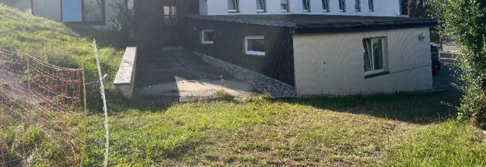 Historisches Juwel mit Zukunft: Vielseitiges Geschäfts- & Mehrfamilienhaus nahe Freiberg