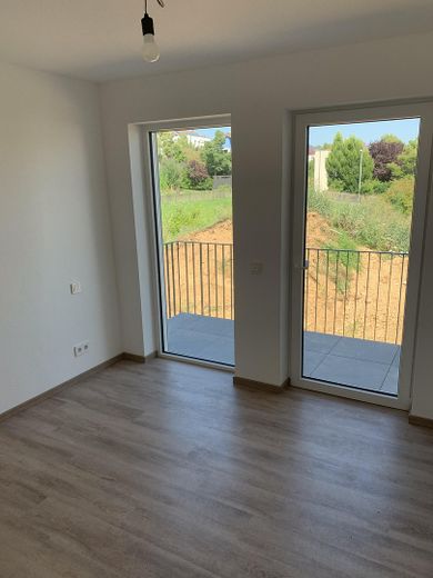 Premium 3-kamerappartement met 2 balkons, prachtig uitzicht en inbouwkeuken aan de rand van het veld! A+ – Schlafzimmer