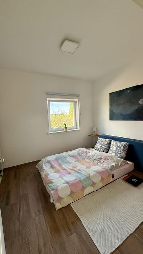Eider yakınında yeni gibi A+ ahşap bungalov – bahçe, tarla manzarası, komisyonsuz – Nordseite Schlafzimmer