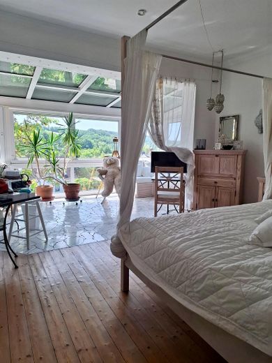 Schlafzimmer mit Wintergarten
