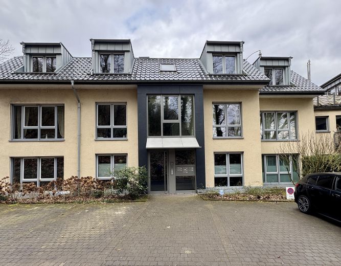 2-Zimmer-Souterrain-Wohnung mit Terrasse und EBK – Außen Ansicht 