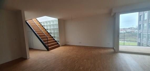 Penthousewohnung mit Wasserblick – Wohn-Esszimmer