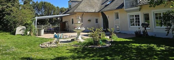 Repräsentative Architektenvilla mit Turm, Einliegerwohnung & parkähnlichem Grundstück - Wohntraum!