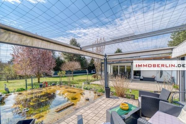 IMMOBERLIN.DE - Südgrundstück mit Bungalowarchitektur und Sonnenterrasse in rückwärtiger Lage