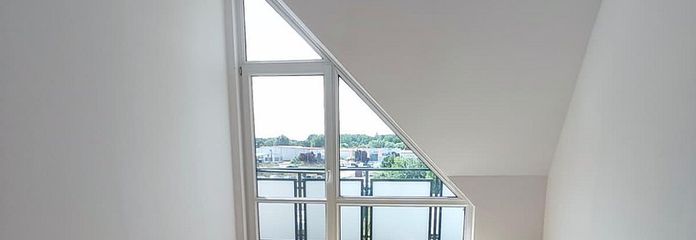 Schlafzimmer mit Balkonzugang
