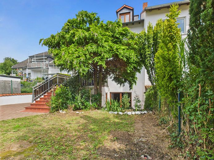 Helle Doppelhaushälfte mit Wintergarten und Einliegerwohnung in familienfreundlicher Lage – Foto 26