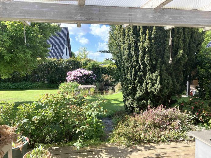 Сонячний бунгало в «Травемюндер Вінкель» – Terrasse mit Blick zum Teich