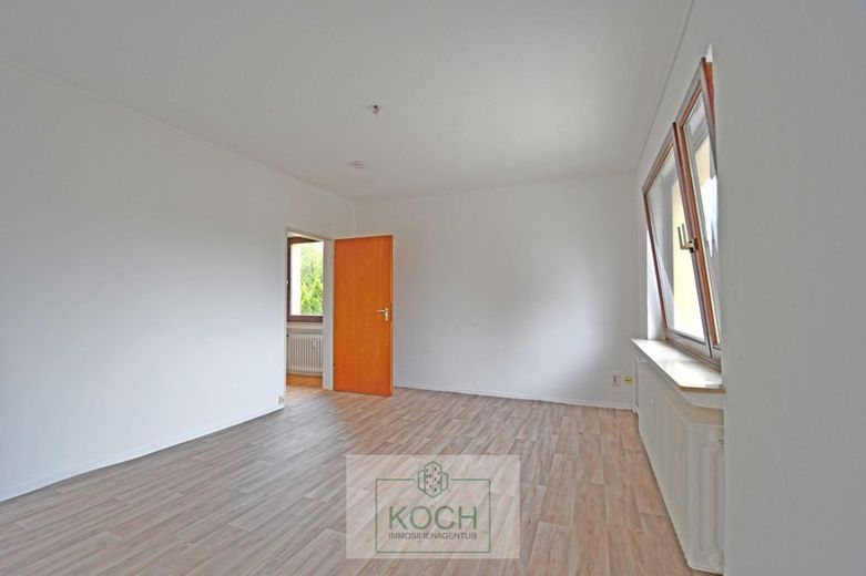 RESERVIERT - Kleines Wohn- und Geschäftshaus am Mecklenburger Weg (Leherheide) – Wohnzimmer_WE3