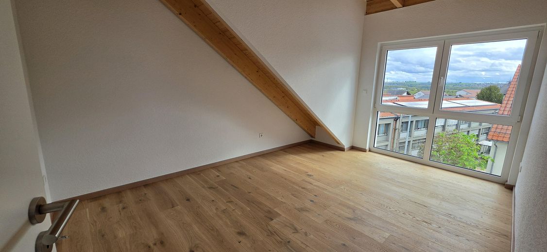Bright 3-room top-floor new-build apartment with a great view – Schlafzimmer