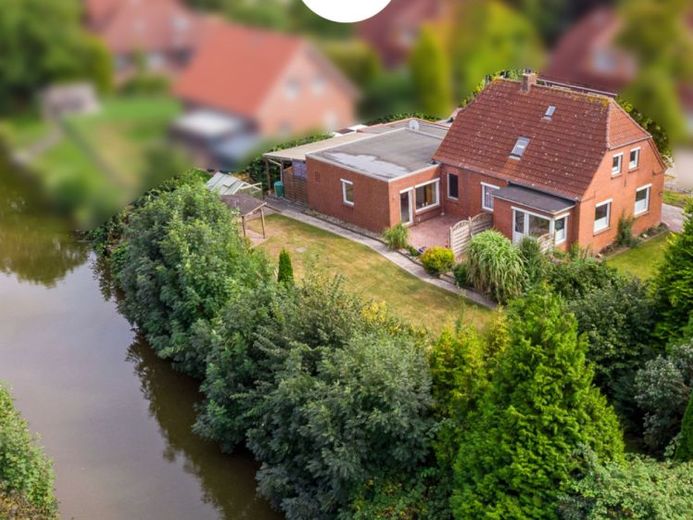 Direkte Kanallage: EFH mit Garage, sichtgeschütztem Garten und potenzieller Einliegerwohnung – Foto 1