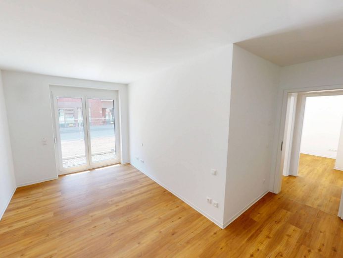 Hell und modern: Große 4-Zimmer-Wohnung mit EBK, 2 BÄDERN und BALKON im Neubauquartier FIELD 4 – Ansicht I: Schlafzimmer I