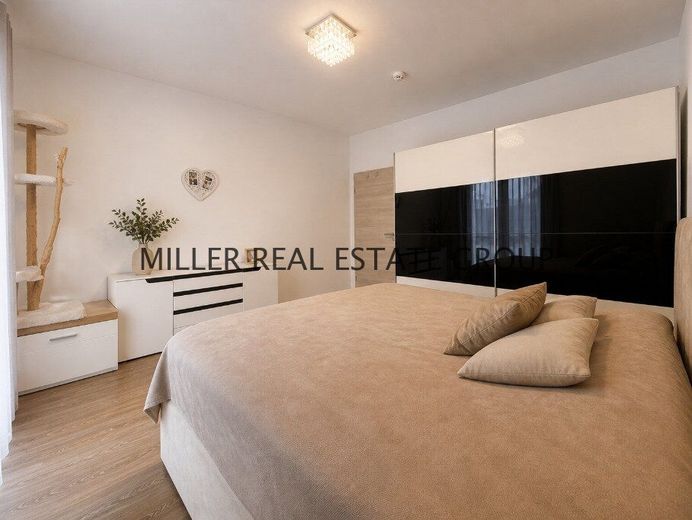 Moderne 4-Zimmer-Erdgeschosswohnung mit Privatgarten, Terrasse &amp; zwei Tiefgaragenstellplätzen! – Schlafzimmer