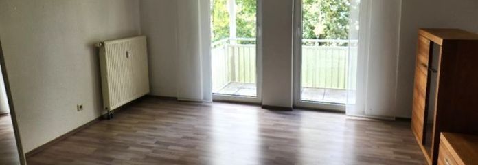 Freiwerdende Familienwohnung mit Balkon und Tiefgaragenstellplatz