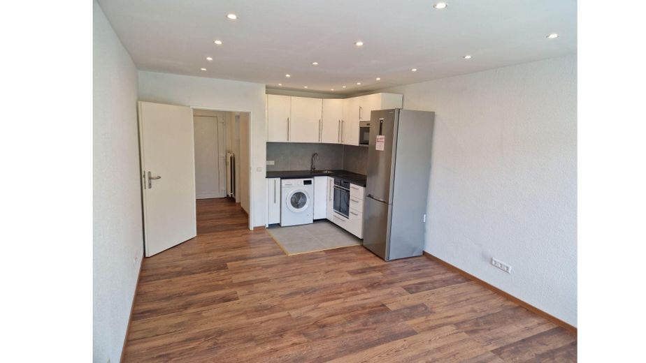 Wohnzimmer mit Küche