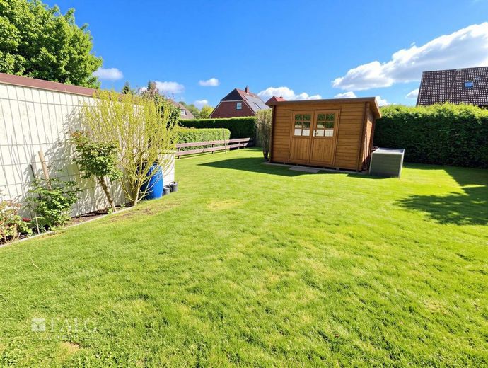 Gepflegtes Einfamilienhaus mit Wintergarten, Kamin &amp; moderner Ausstattung – Garten zum Süden