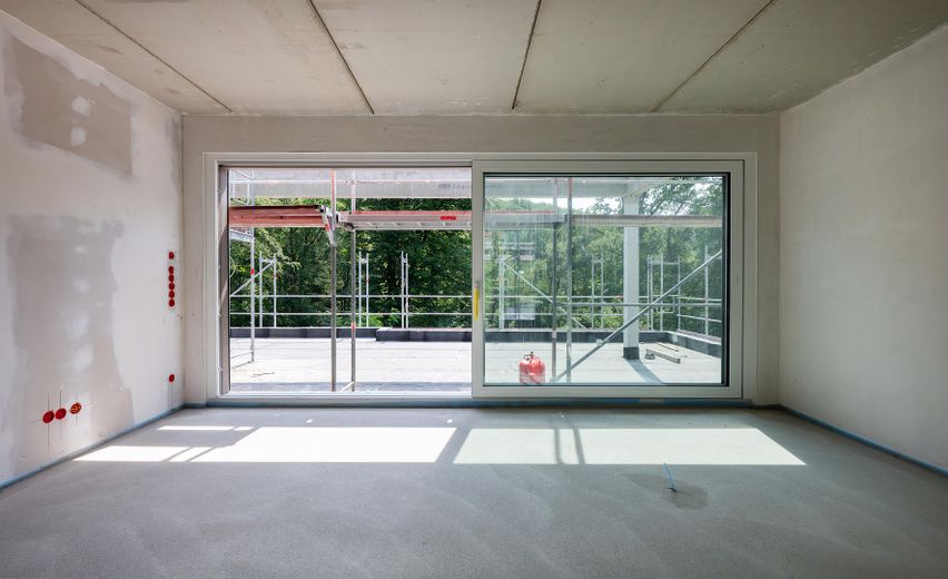 Wohnen über den Dingen – exklusives Penthouse mit Dachterrasse und traumhaftem Waldblick – Ausblick aus dem Wohnbereich