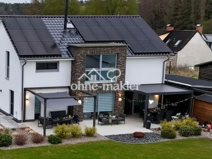 Paraíso familiar: moderna casa unifamiliar con gran jardín – eficiente energéticamente y sin comisión – Foto 1