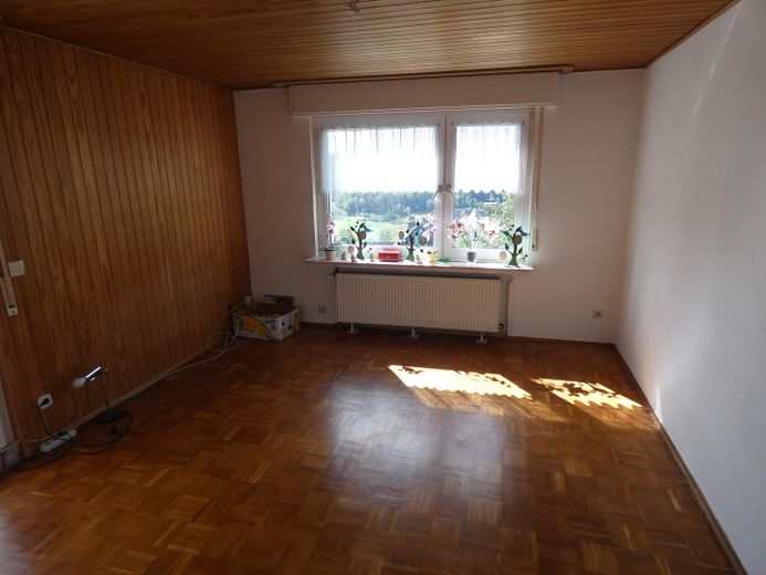 Mehrfamilienhaus mit Südlage und traumhaftem Ausblick – Wohnzimmer EG