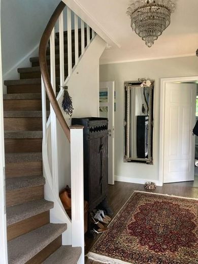 Exclusive country house near Sylt with ambiance & flair – Flur mit Treppe ins DG