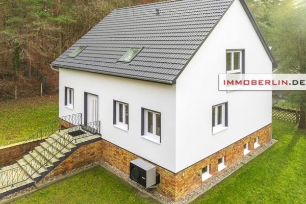 IMMOBERLIN.DE - Ersteinzug! Sehr attraktives Haus mit Südterrasse, Garage & Sonnengarten