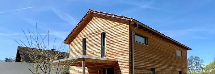 Exclusive, like-new detached house in Hof with southwest terrace, garage complex and sauna