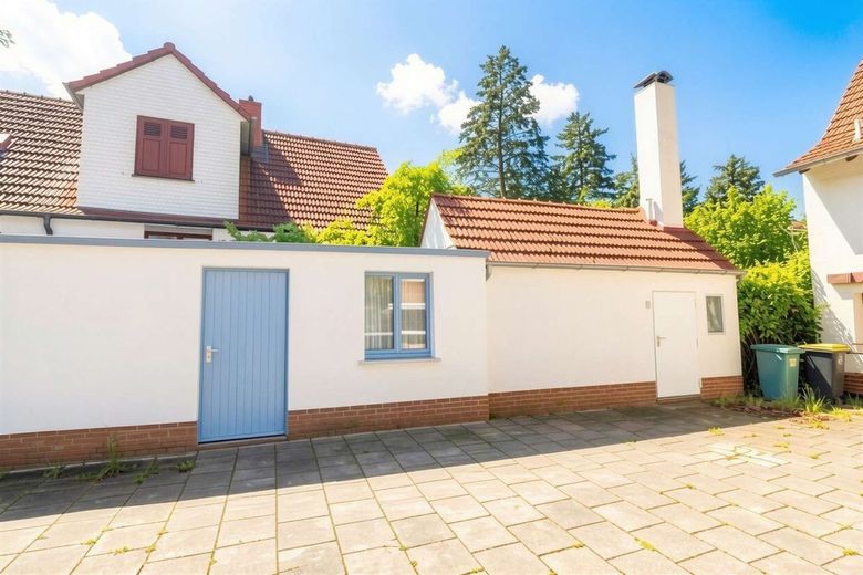WRS Immobilien - Langenselbold - ruhige + grüne Innenstadtlage - Abrissgrundstück für MFH + DHH  + RH – Außenansicht - Seitengebäude - Garage + Heizung