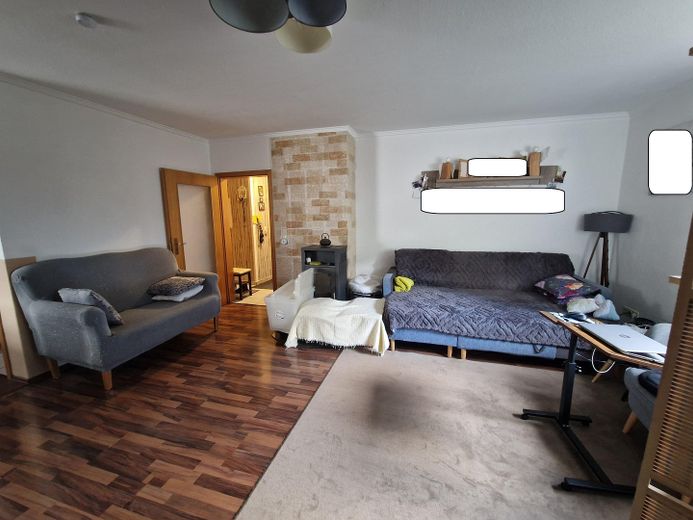 Seltene Gelegenheit in Holtorf: Großzügiges Zweifamilienhaus mit Terrasse und Garage – Wohnzimmer im Erdgeschoß