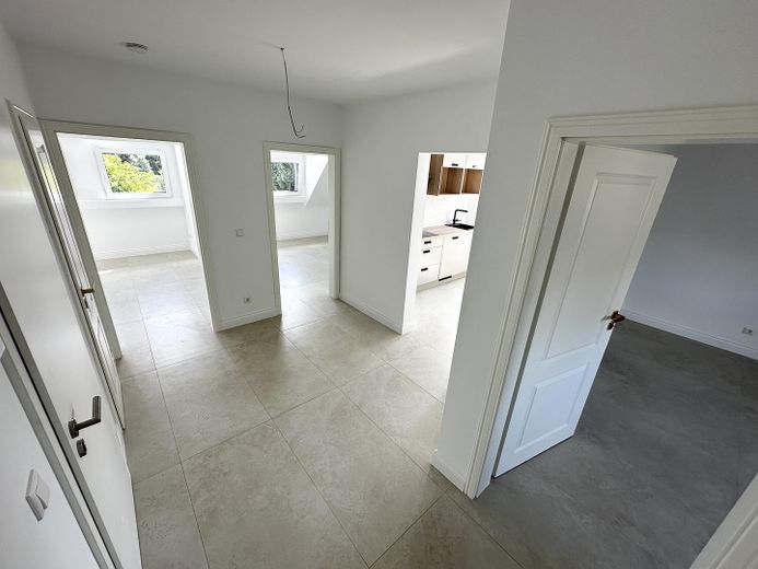 Appartamento di alta qualità di 55 m², standard di nuova costruzione, prima occupazione, completamente ristrutturato, riscaldamento a pavimento – Foto 4