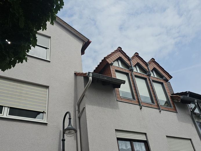 Das Fackelrondell ist nur ein Steinwurf entfernt. 
Große Wohnung im Quartier Kotten zu verkaufen! – Neubauteil mit Spitzdachgauben