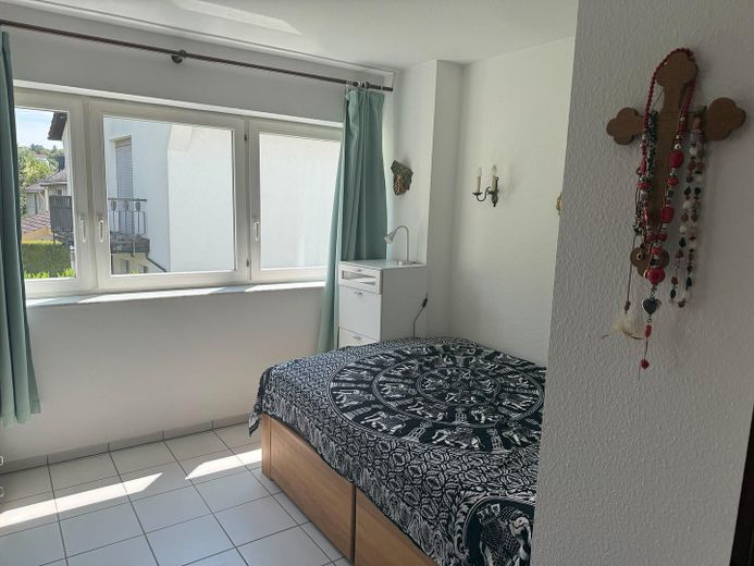 Naturnahe, idyllische Terassen/Gartenwohnung in ruhiger Weinberglage – Schlafzimmer