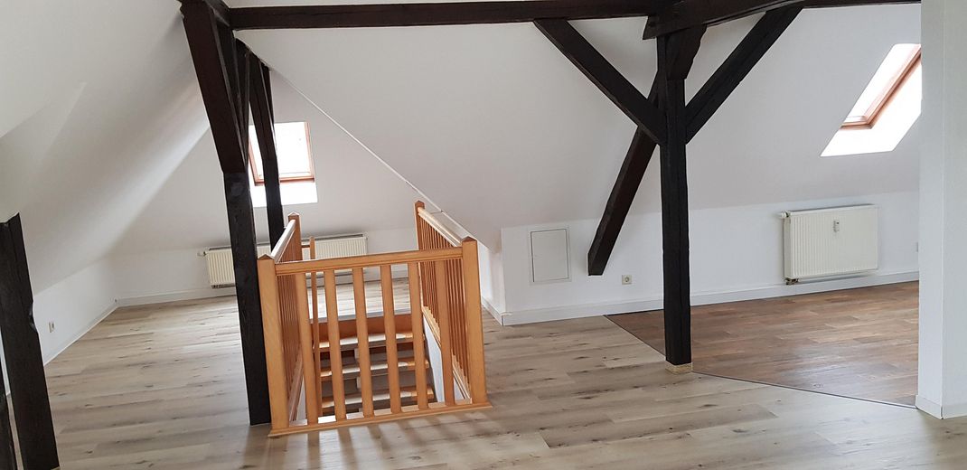 Wohnzimmer mit Treppenbrüstung