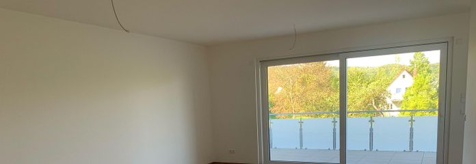 Wohn-Esszimmer mit Balkon