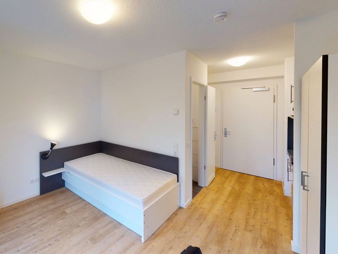 ** Modernes und vollmöbliertes 1-Zimmer-Apartment mit EINBAUKÜCHE, eigenem BALKON und gemeinschaftlicher DACHTERRASSE ** – Ansicht III: Wohn- und Schlaf…