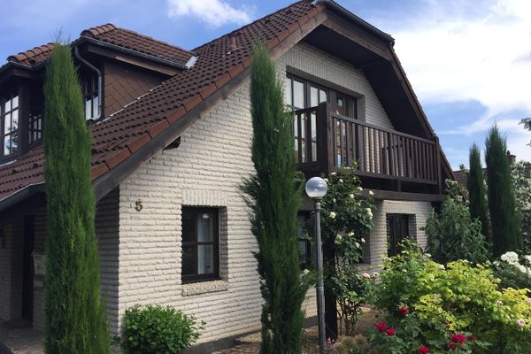 Encantadora casa unifamiliar con vivienda anexa y mucho espacio para toda la familia