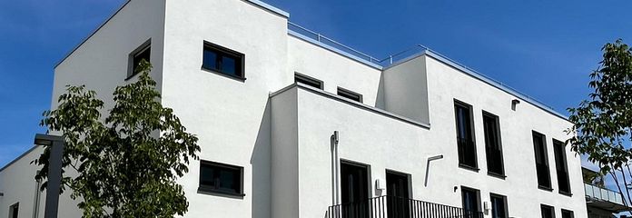 Erstbezug in Frechen: Moderne 3-Zimmer-Wohnung mit Garten und hochwertiger Ausstattung – Hausansicht 