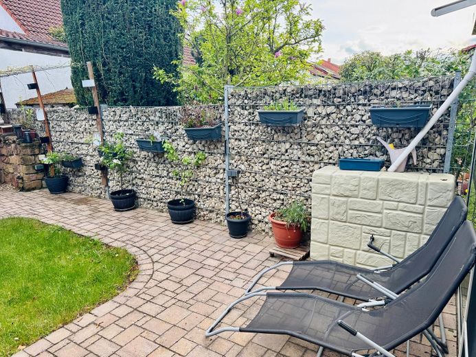 Casa unifamiliare ben tenuta in posizione periferica a Ludwigshafen Ruchheim – Garten 