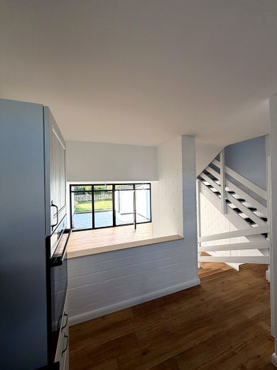 Neuwertiges Reihenmittelhaus, Fußbodenheizung, eigenem Garten & Garage – Erdgeschoss 