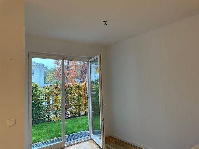 Wohnen am See in der Natur: Moderne Wohnung mit Terrasse und Garten – Foto 9