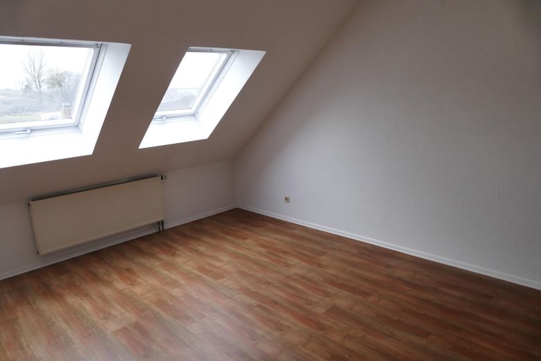 Dachgeschosswohnung mit Weitblick – Schlafzimmer